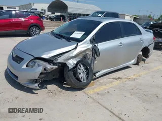 2009 Toyota Corolla with VIN 1NXBU40E39Z102927, listed as a IAAI auction lot 41864609 with 82,840 mi miles. Bid and sale history available at carsss.com. Image 2.