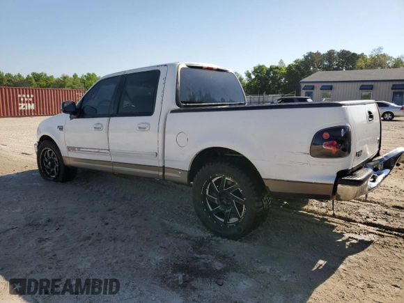 2001 Ford F-150 XLT with VIN 1FTRW07W11KB44405, listed as a Copart auction lot 53560595 with 272,881 mi miles and Salvage title. Bid and sale history available at DreamBid. Image 2.