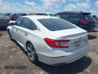 2019 Honda Accord Touring with VIN 1HGCV2F96KA015987, listed as a IAAI auction lot 42528744 with 174,735 mi miles and . Bid and sale history available at DreamBid. Image 3.