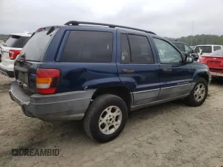 2002 Jeep Grand Cherokee z VIN 1J4GX38S42C229150, wystawiony jako Copart lot #72586834 z przebiegiem 201 103 mil mil oraz Szkoda całkowita • Salvage title. Historia ofert i sprzedaży dostępna na DreamBid. Obrazek 3.