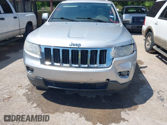 2012 Jeep Grand Cherokee Laredo with VIN 1C4RJEAG4CC167557, listed as a IAAI auction lot 42047720 with 195,631 mi miles. Bid and sale history available at carsss.com. Image 13.