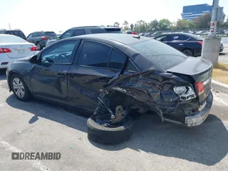2014 Chevrolet Cruze LS z VIN 1G1PA5SG1E7405326, wystawiony jako IAAI lot #42095319 z przebiegiem Nie podano mil oraz . Historia ofert i sprzedaży dostępna na DreamBid. Obrazek 13.