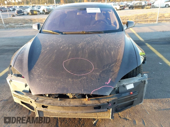 2013 Tesla Model S with VIN 5YJSA1CN7DFP22690, listed as a IAAI auction lot 40981089 with 188,057 mi miles. Bid and sale history available at carsss.com. Image 10.