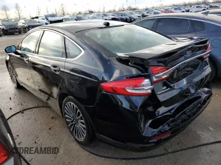 2018 Ford Fusion Hybrid Titanium with VIN 3FA6P0RU5JR120394, listed as a Copart auction lot 73557602 with 148,870 mi miles. Bid and sale history available at carsss.com. Image 2.