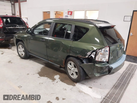 2008 Jeep Compass Sport with VIN 1J8FF47W28D534267, listed as a IAAI auction lot 42009243 with 122,720 mi miles and . Bid and sale history available at carsss.com. Image 3.