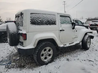 2014 Jeep Wrangler Sahara with VIN 1C4AJWBG5EL327823, listed as a Copart auction lot 85472404 with 136,132 mi miles and Clean Title. Bid and sale history available at DreamBid. Image 3.
