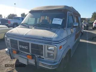1989 GMC Vandura z VIN 1GDEG25K1K7521984, wystawiony jako IAAI lot #41371811 z przebiegiem 43 502 mil mil oraz . Historia ofert i sprzedaży dostępna na DreamBid. Obrazek 2.