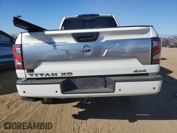 2021 Nissan Titan SV with VIN 1N6AA1FB0MN517885, listed as a Copart auction lot 77046004 with 52,284 mi miles and Salvage title. Bid and sale history available at DreamBid. Image 6.