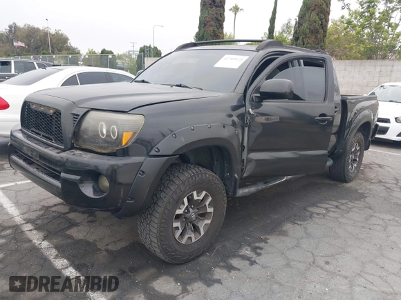 2009 Toyota Tacoma PreRunner with VIN 3TMJU62N99M076105, listed as a IAAI auction lot 42709523 with 206,948 mi miles and . Bid and sale history available at DreamBid. Image 2.