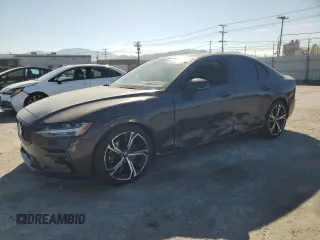 2024 Volvo S60 Plus Dark Theme with VIN 7JRL12FL0RG312462, listed as a Copart auction lot 64261165 with 18,253 mi miles and Salvage title. Bid and sale history available at DreamBid. Image 1.
