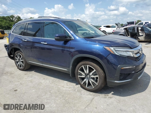 2022 Honda Pilot Touring 7-Passenger with VIN 5FNYF5H64NB017528, listed as a Copart auction lot 65406285 with 64,652 mi miles and Salvage title. Bid and sale history available at DreamBid. Image 4.