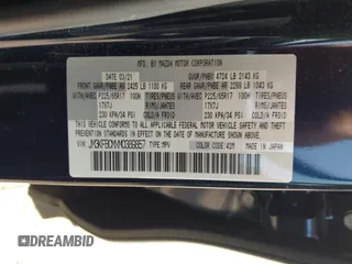 2021 Mazda CX-5 Touring z VIN JM3KFBCMXM0389857, wystawiony jako IAAI lot #42309650 z przebiegiem 49 938 mil mil oraz . Historia ofert i sprzedaży dostępna na DreamBid. Obrazek 9.