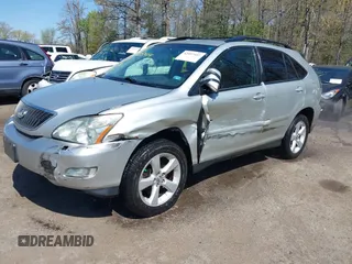 2006 Lexus RX 330 with VIN 2T2HA31U76C093953, listed as a IAAI auction lot 42057414 with 100,934 mi miles. Bid and sale history available at carsss.com. Image 2.