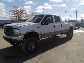 1999 Ford Super Duty F-250 XL with VIN 1FTNW21F0XEA24718, listed as a Copart auction lot 44987595 with 327,455 mi miles and Salvage Title. Bid and sale history available at carsss.com. Image 1.