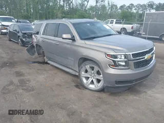 2018 Chevrolet Tahoe LT z VIN 1GNSCBKC9JR253048, wystawiony jako IAAI lot #42398901 z przebiegiem 199 994 mil mil oraz . Historia ofert i sprzedaży dostępna na DreamBid. Obrazek 1.