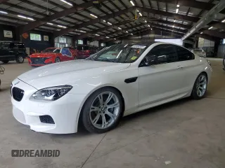 2014 BMW M6 с VIN WBSLX9C58ED160480, выставлен на аукционе Copart как лот 64464985 с пробегом 58 514 миль миль и Чистый • Clean title. История ставок и продаж доступна на DreamBid. Изображение 1.