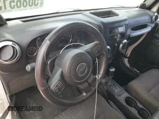 2012 Jeep Wrangler Arctic with VIN 1C4AJWBG1CL154184, listed as a Copart auction lot 50865135 with 152,767 mi miles and Clean title. Bid and sale history available at DreamBid. Image 8.