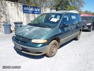 1999 Dodge Caravan SE with VIN 2B4GP45R7XR410283, listed as a IAAI auction lot 41861470 with 139,819 mi miles. Bid and sale history available at carsss.com. Image 2.