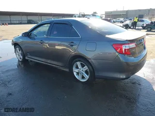 2014 Toyota Camry Hybrid LE with VIN 4T1BD1FK8EU135234, listed as a IAAI auction lot 41399246 with 104,964 mi miles. Bid and sale history available at carsss.com. Image 3.