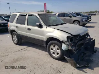 2005 Ford Escape XLT with VIN 1FMYU93105KC50944, listed as a Copart auction lot 50500965 with 133,532 mi miles and Salvage Title. Bid and sale history available at DreamBid. Image 4.