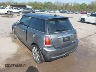 2009 MINI Hardtop S with VIN WMWMF73509TW86792, listed as a IAAI auction lot 41766406 with 174,724 mi miles and . Bid and sale history available at DreamBid. Image 3.
