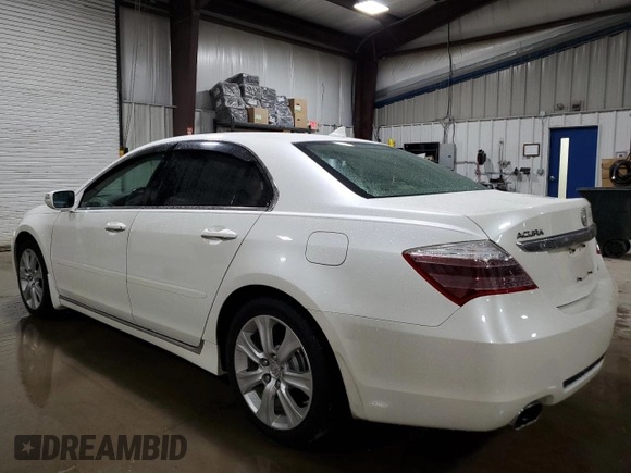 2009 Acura RL Tech Pkg with VIN JH4KB26679C002302, listed as a Copart auction lot 50381735 with 166,591 mi miles and Salvage Title. Bid and sale history available at carsss.com. Image 2.