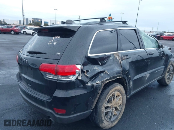 2019 Jeep Grand Cherokee Altitude with VIN 1C4RJEAGXKC826742, listed as a IAAI auction lot 41769722 with 91,905 mi miles and . Bid and sale history available at DreamBid. Image 4.