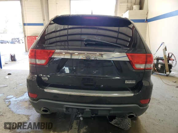 2013 Jeep Grand Cherokee Overland with VIN 1C4RJFCT5DC640710, listed as a Copart auction lot 41474875 with 223,668 mi miles and Clean Title. Bid and sale history available at carsss.com. Image 6.