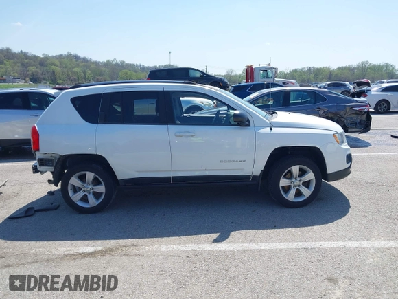 2011 Jeep Compass Latitude with VIN 1J4NT1FB2BD236439, listed as a IAAI auction lot 41935842 with 164,893 mi miles. Bid and sale history available at carsss.com. Image 14.