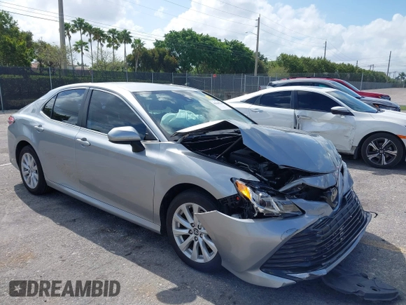 2019 Toyota Camry LE with VIN 4T1B11HK4KU249720, listed as a IAAI auction lot 41940728 with 35,891 mi miles and . Bid and sale history available at DreamBid. Image 1.