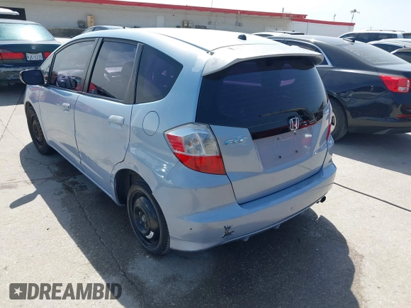 2009 Honda Fit with VIN JHMGE88289S004009, listed as a IAAI auction lot 41803838 with 194,304 mi miles. Bid and sale history available at carsss.com. Image 3.