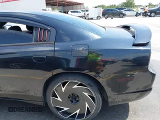 2013 Dodge Charger SE with VIN 2C3CDXBG5DH535058, listed as a IAAI auction lot 42101566 with 205,790 mi miles and . Bid and sale history available at DreamBid. Image 6.
