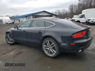 2015 Audi A7 3.0 Premium Plus with VIN WAUWGAFC2FN010308, listed as a Copart auction lot 40961294 with 102,997 mi miles and Salvage Title. Bid and sale history available at carsss.com. Image 2.