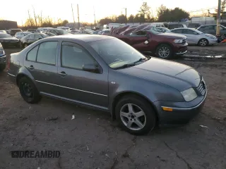 2004 Volkswagen Jetta GL with VIN 3VWRK69M74M002287, listed as a Copart auction lot 46682325 with 104,970 mi miles and Salvage title. Bid and sale history available at DreamBid. Image 4.