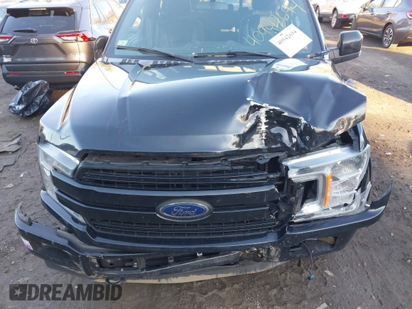 2018 Ford F-150 XL with VIN 1FTEW1EP7JFB77823, listed as a IAAI auction lot 40942694 with 163,078 mi miles. Bid and sale history available at carsss.com. Image 6.