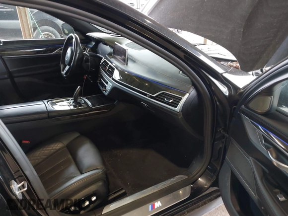 2020 BMW 7 Series 750i xDrive with VIN WBA7U2C02LGJ59475, listed as a IAAI auction lot 41975021 with 52,818 mi miles and . Bid and sale history available at carsss.com. Image 5.