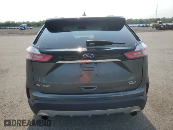 2019 Ford Edge SEL z VIN 2FMPK4J9XKBC67141, wystawiony jako Copart lot #60271615 z przebiegiem 100 400 mil mil oraz Szkoda całkowita • Salvage title. Historia ofert i sprzedaży dostępna na DreamBid. Obrazek 6.