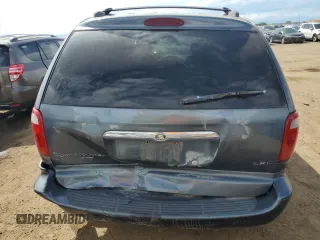 2001 Chrysler Town & Country LXi with VIN 2C4GP54L11R176042, listed as a Copart auction lot 69045254 with 217,421 mi miles and Salvage Title. Bid and sale history available at DreamBid. Image 6.