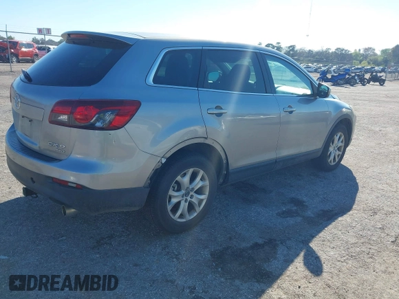2013 Mazda CX-9 Sport with VIN JM3TB3BA4D0406522, listed as a IAAI auction lot 41662220 with 169,262 mi miles and . Bid and sale history available at carsss.com. Image 4.