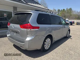 2011 Toyota Sienna XLE with VIN 5TDDK3DC3BS007297, listed as a IAAI auction lot 42158709 with 208,274 mi miles and . Bid and sale history available at DreamBid. Image 4.