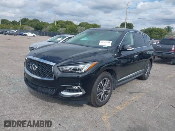 2019 Infiniti QX60 LUXE with VIN 5N1DL0MN0KC549578, listed as a IAAI auction lot 41362311 with 162,457 mi miles. Bid and sale history available at carsss.com. Image 2.