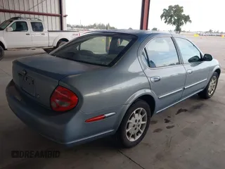 2000 Nissan Maxima GXE z VIN JN1CA31D1YT727156, wystawiony jako IAAI lot #42145772 z przebiegiem 208 427 mil mil oraz . Historia ofert i sprzedaży dostępna na DreamBid. Obrazek 4.