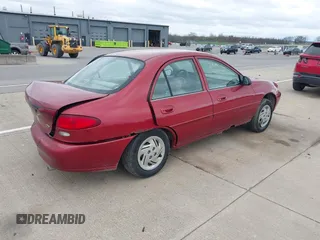1998 Ford Escort SE z VIN 1FAFP13P4WW124031, wystawiony jako IAAI lot #42077199 z przebiegiem 170 165 mil mil oraz . Historia ofert i sprzedaży dostępna na DreamBid. Obrazek 4.
