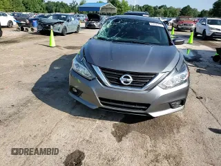 2016 Nissan Altima SR with VIN 1N4AL3AP8GC284372, listed as a Copart auction lot 63856255 with 145,086 mi miles and Salvage title. Bid and sale history available at DreamBid. Image 13.