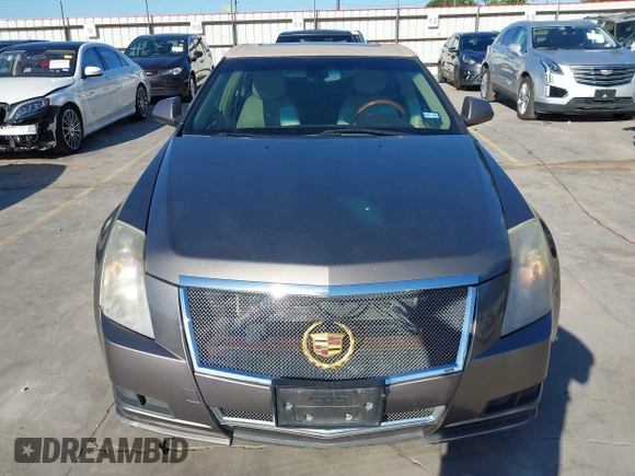 2012 Cadillac CTS Luxury z VIN 1G6DF5E58C0142041, wystawiony jako IAAI lot #42235864 z przebiegiem 59 697 mil mil oraz . Historia ofert i sprzedaży dostępna na DreamBid. Obrazek 12.