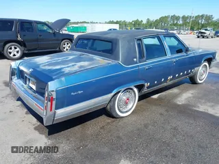 1991 Cadillac Brougham z VIN 1G6DW547XMR708197, wystawiony jako IAAI lot #42112042 z przebiegiem Nie podano mil oraz . Historia ofert i sprzedaży dostępna na DreamBid. Obrazek 4.
