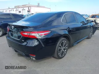 2018 Toyota Camry LE z VIN 4T1B11HK2JU002873, wystawiony jako IAAI lot #41637537 z przebiegiem 136 950 mil mil oraz . Historia ofert i sprzedaży dostępna na DreamBid. Obrazek 4.