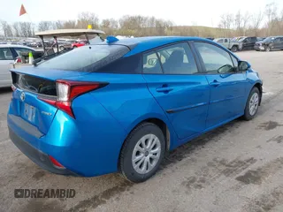 2021 Toyota Prius L Eco with VIN JTDKAMFU5M3145949, listed as a IAAI auction lot 42113123 with 127,872 mi miles and . Bid and sale history available at DreamBid. Image 4.
