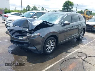 2019 Mazda CX-9 Touring with VIN JM3TCACY6K0334085, listed as a IAAI auction lot 42391595 with 113,723 mi miles and . Bid and sale history available at DreamBid. Image 17.