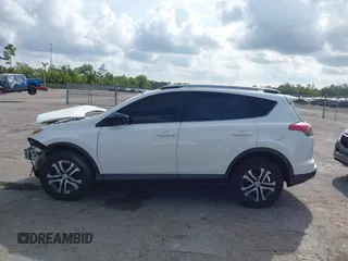2017 Toyota RAV4 LE with VIN JTMZFREV3HJ143416, listed as a IAAI auction lot 41861981 with 115,241 mi miles and . Bid and sale history available at DreamBid. Image 14.